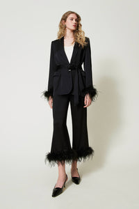 Pantalon Twinset en satin avec plumes