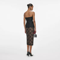 Ensemble haut en taffetas autoportrait et jupe midi